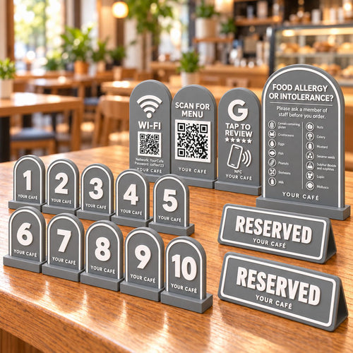 Café Starter Kit in grey: table numbers 1 to 10, Wi-Fi and menu QR signs, tap-to-review NFC card, allergen sign and reserved table signs